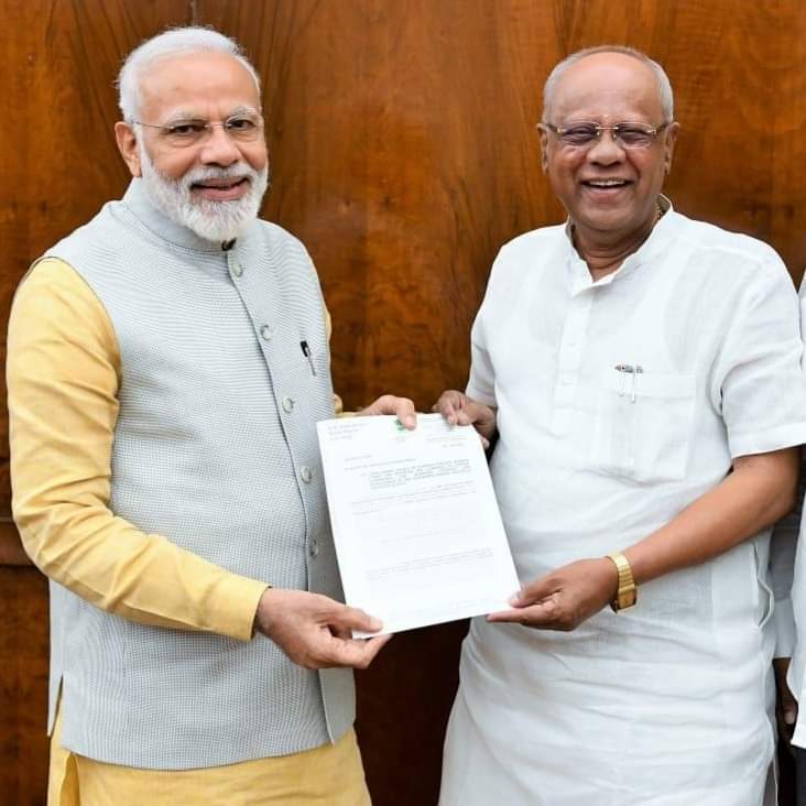 GM SIDDESHWAR WITH PM MODI PETROL PRICE